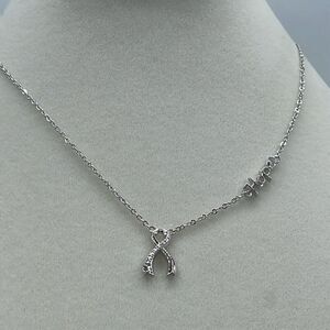 A.U. Ribbon and Hope Rhodium plated CZ necklace.
